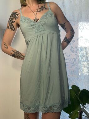 Blue Slip Dress with Lace Trim and Charm Detail